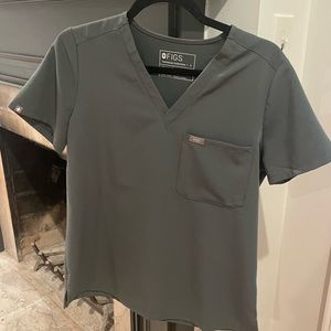 Size small FIGS scrub top. Never worn.